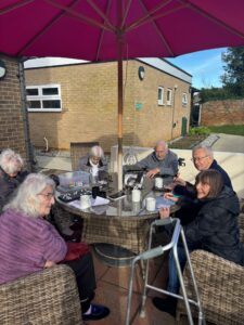 Kingsclere Court outdoor activities bring residents together for sunshine, fresh air, and meaningful outdoor pen pal moments.