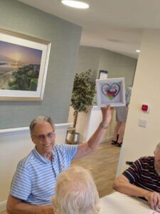 Kingsclere Court arts workshop inspired creativity as residents enjoyed making sea glass pictures and sun catchers in a fun, friendly session.