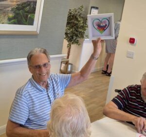 Kingsclere Court arts workshop inspired creativity as residents enjoyed making sea glass pictures and sun catchers in a fun, friendly session.